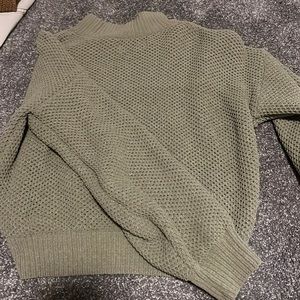 This is a green size small Hollister sweater.